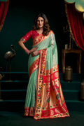 Sea Green Tissue Paithani saree with lotus Zari work and matching blouse