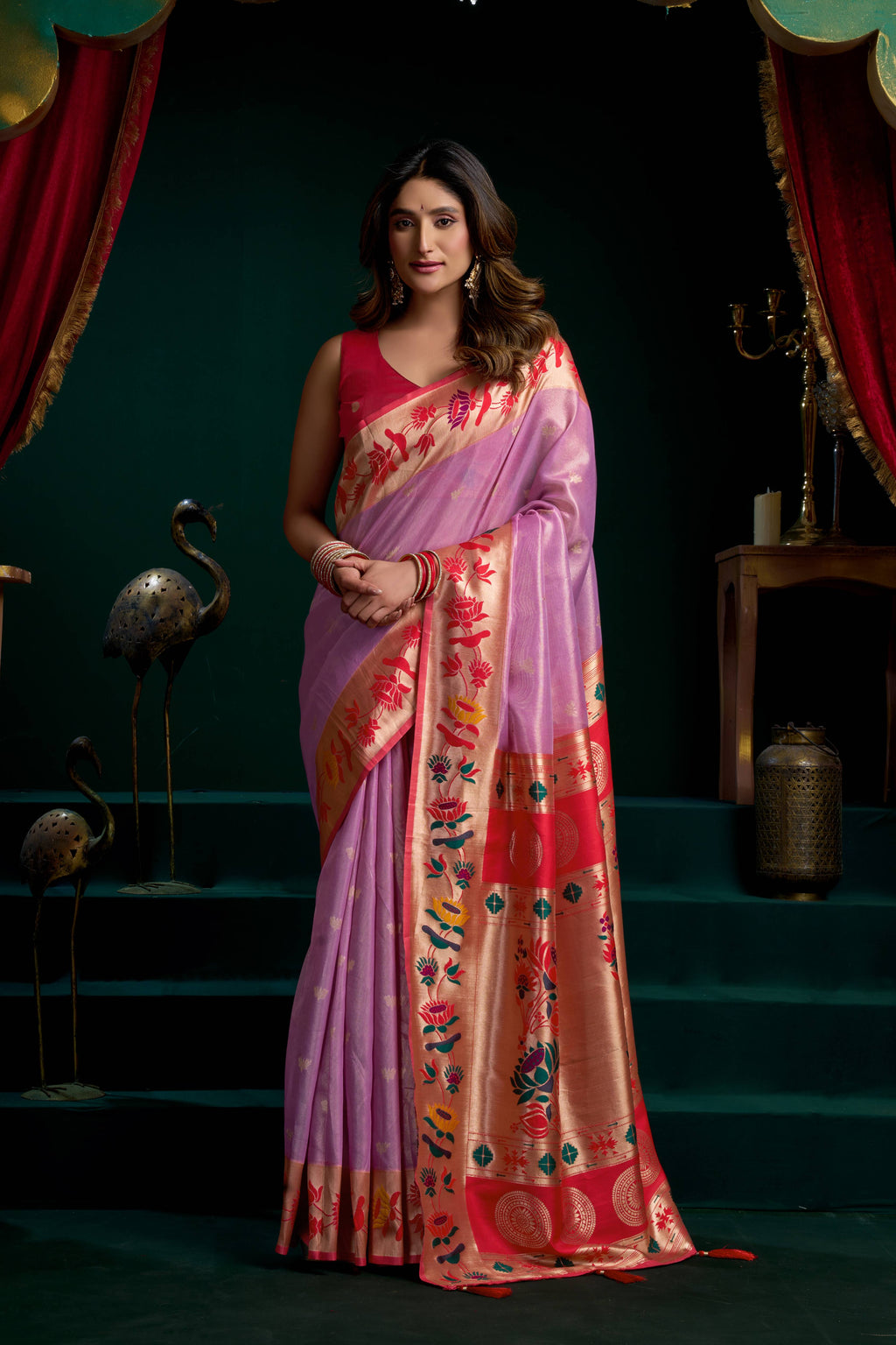 Elegant purple tissue Paithani saree with intricate Meena lotus zari weaving and matching blouse fabric.