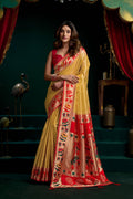 Mustard Tissue Paithani saree with intricate gold lotus Zari weaving and matching blouse