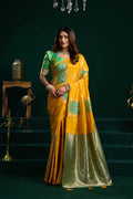 Yellow soft silk saree with gold Zari weaving and fancy pumpum detail