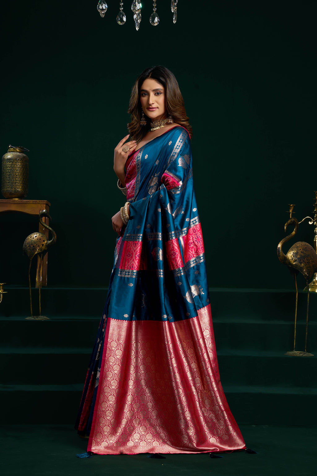 Blue soft silk saree with fancy pumpum border and Zari woven details