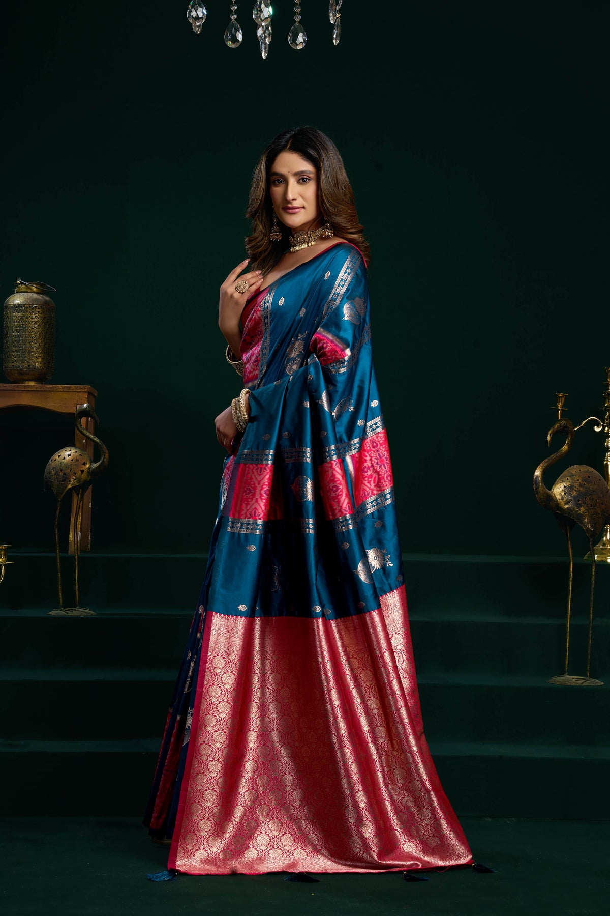 Blue soft silk saree with fancy pumpum border and Zari woven details