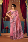 Pink modal saree with sophisticated zari woven details and matching blouse