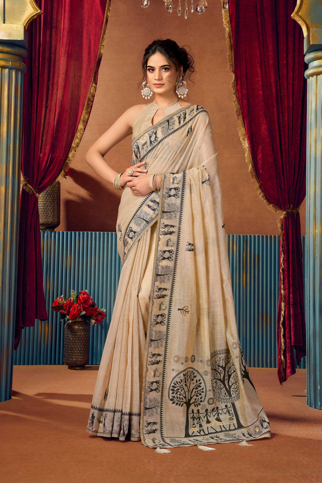 Elegant beige modal saree with intricate zari woven patterns and matching unstitched blouse piece