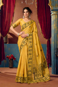 Yellow modal saree with intricate zari woven details and matching blouse