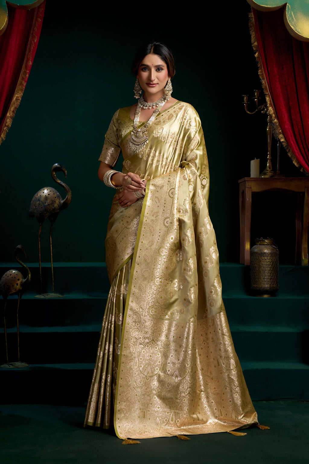 Mehendi colored satin silk saree with zari weaving and fancy pumpum detailing