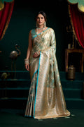 Turquoise satin silk saree with Zari work and fancy pumpum border