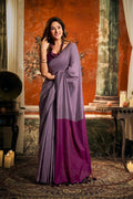 Purple cotton saree with a contrast pallu and fancy tassel detailing