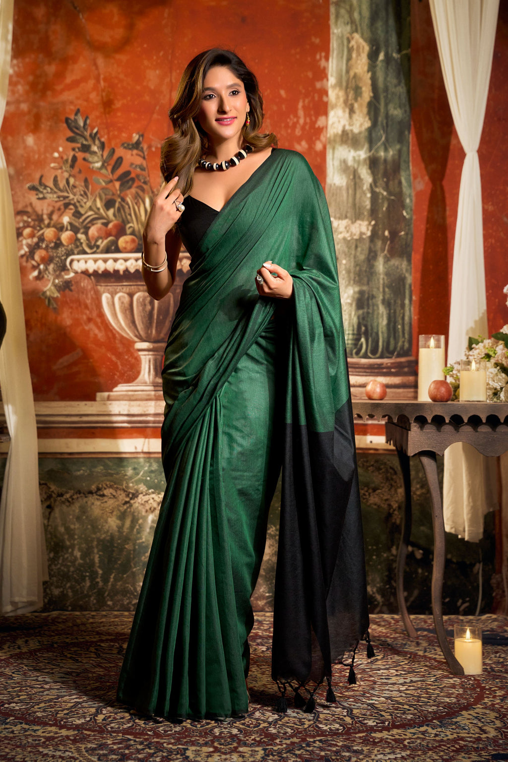 Bottle Green cotton saree with contrast pallu and decorative tassels