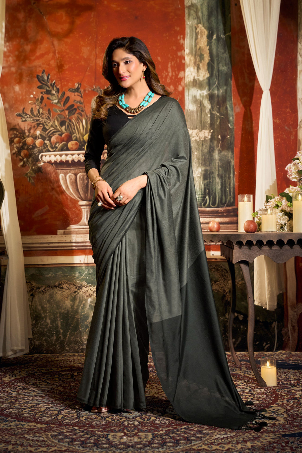 Dark grey cotton saree with contrast pallu and fancy tassels