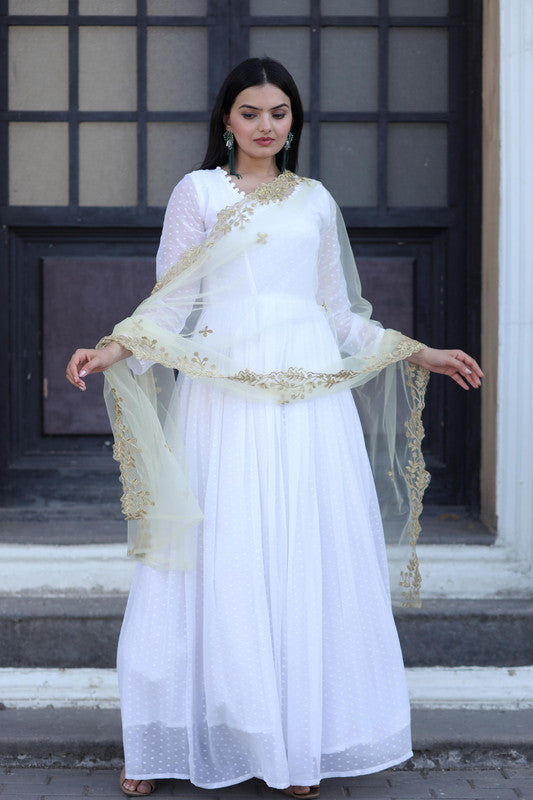 White Faux Georgette Anarkali dress featuring butti work and included dupatta