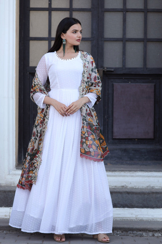 Elegant white georgette Anarkali dress with intricate butti work and matching dupatta