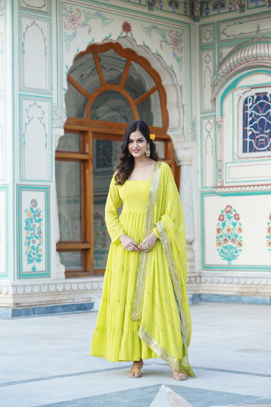 Parrot green faux georgette Anarkali dress with frill accents and dupatta