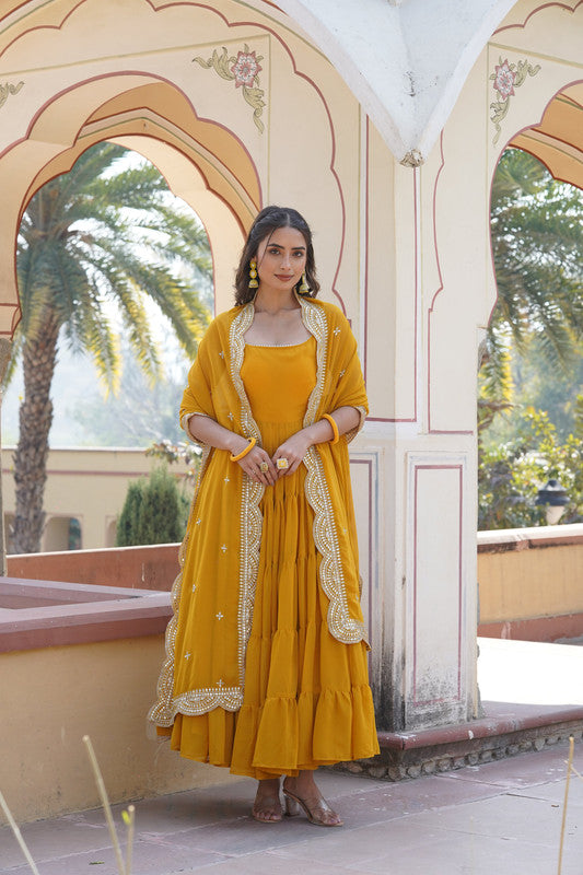 Yellow faux georgette Anarkali dress with frill accents and dupatta
