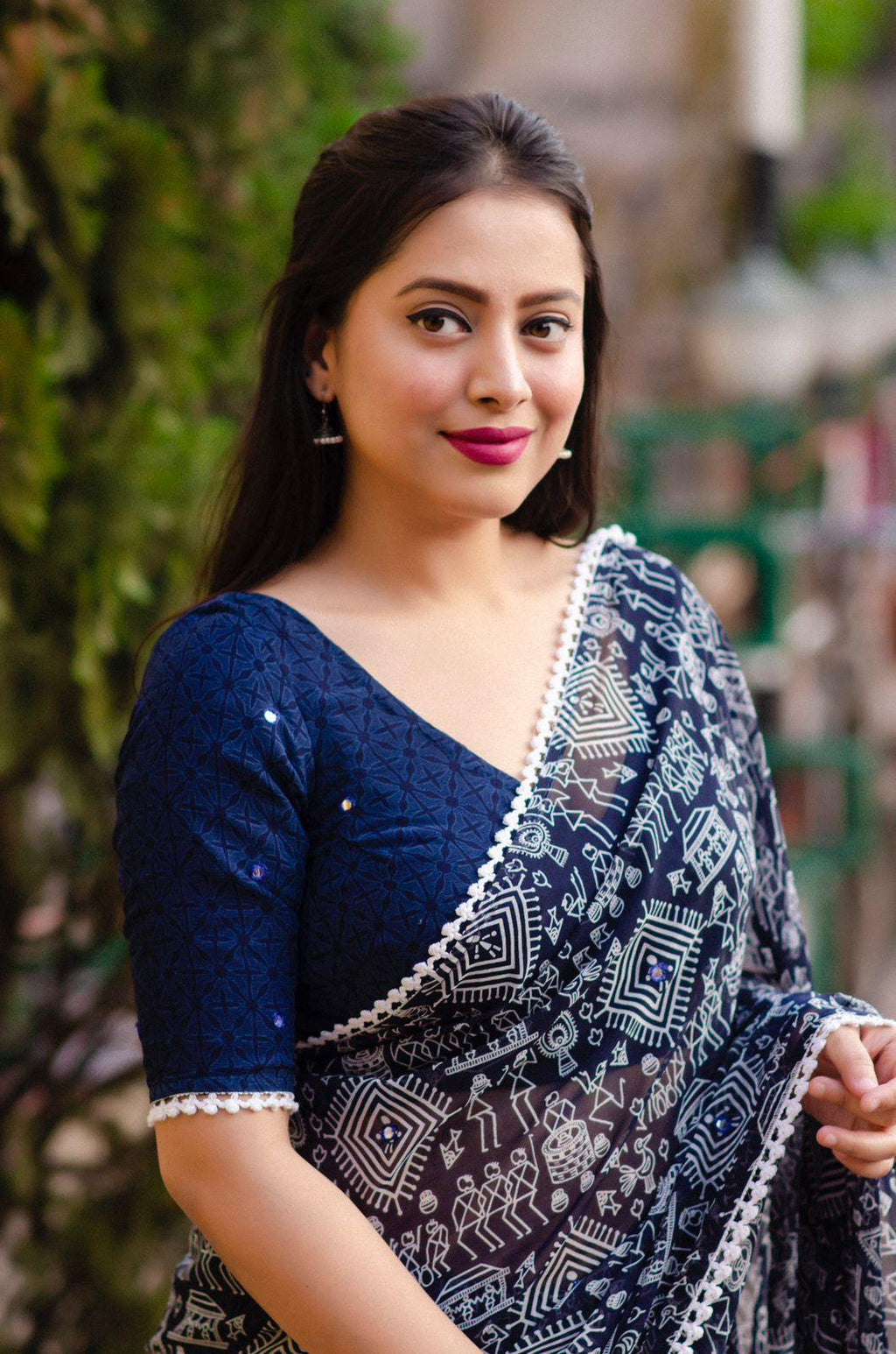 Blue Poly Georgette Saree with Aari Mirror Work and Ethnic Motifs