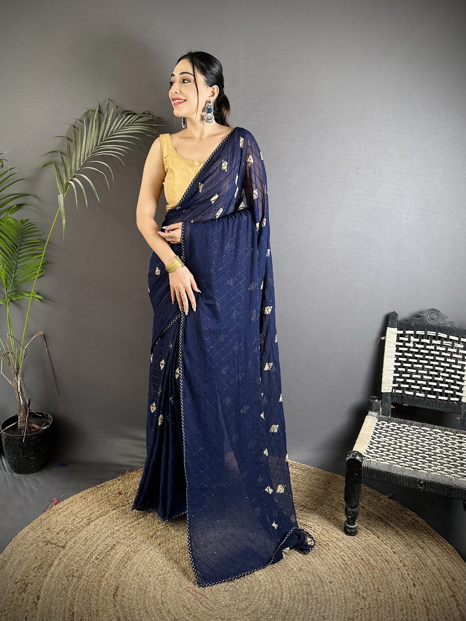 Navy blue georgette saree with white polka dot pattern
