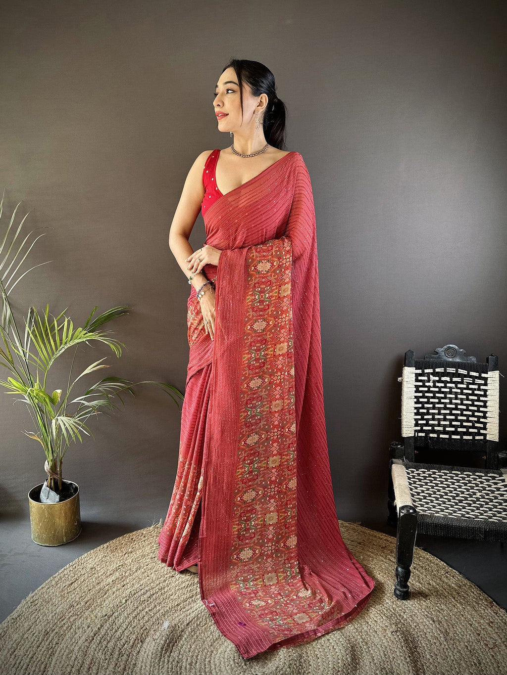 Red Georgette saree featuring an attractive and modern foil print