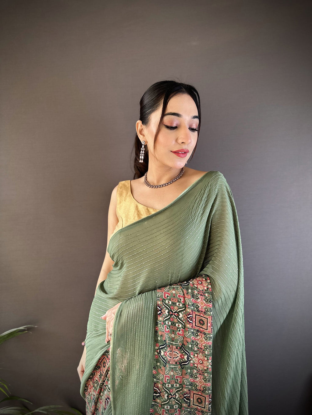 Mehendi Green Georgette Saree with Attractive Foil Print