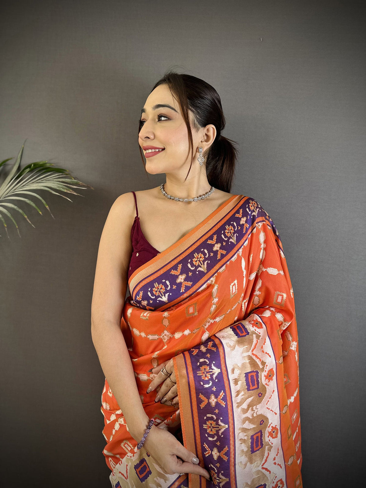 Orange Banarasi Silk Saree with Nature-Inspired Motifs