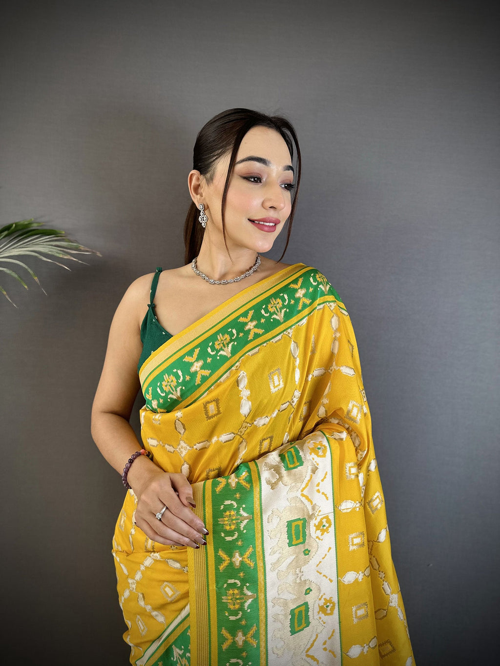 Yellow Banarasi Silk Saree with Nature Inspired Motifs