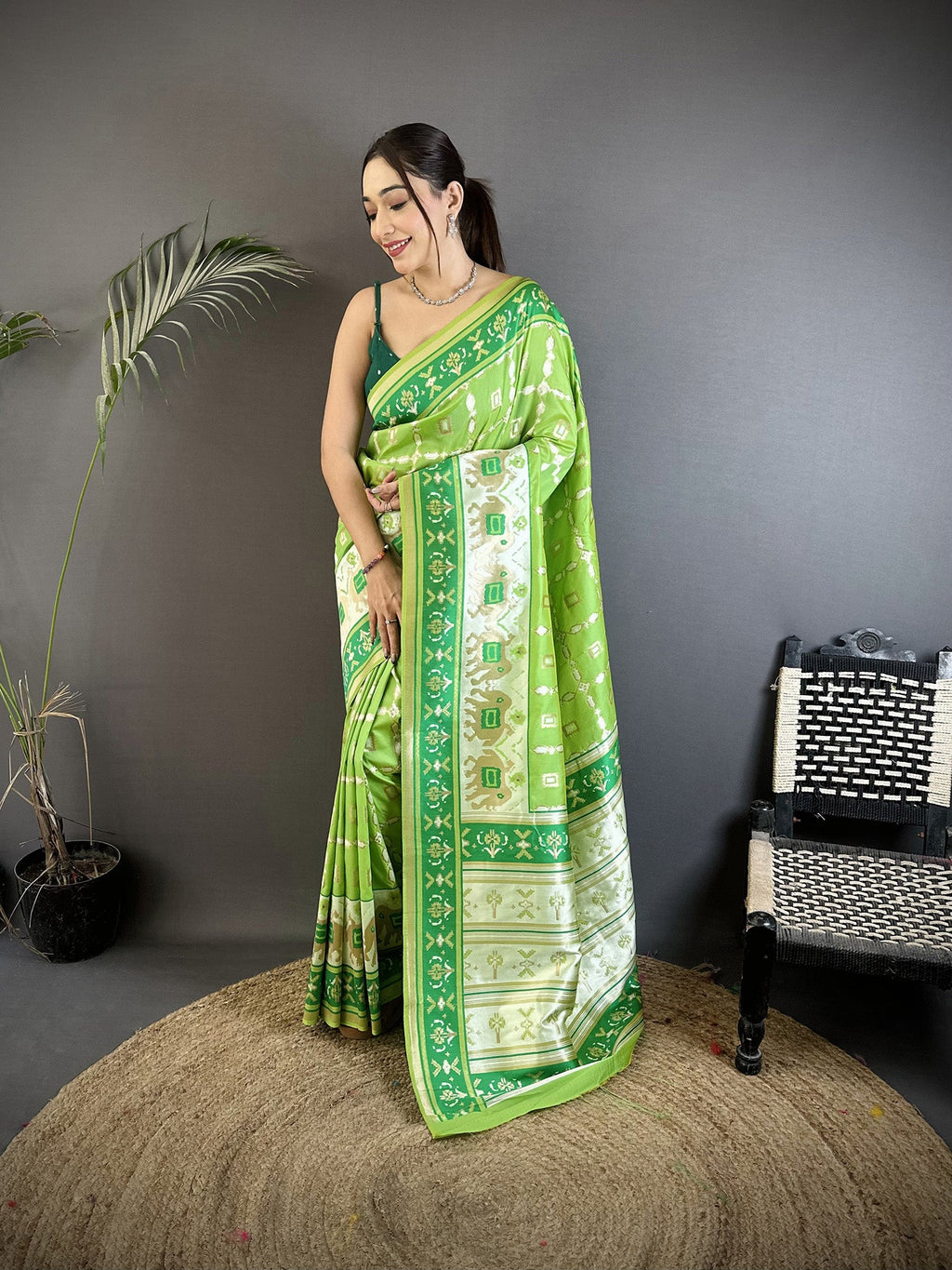Pear Green Banarasi silk saree with detailed nature-inspired floral motifs