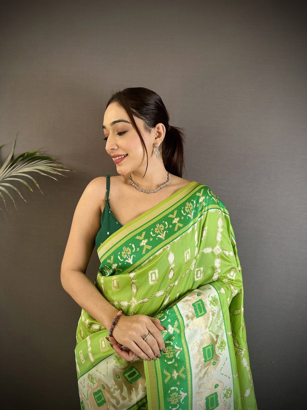 Pear Green Banarasi Silk Saree with Nature Motifs