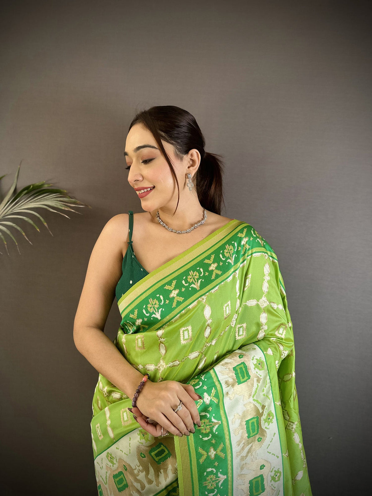 Pear Green Banarasi Silk Saree with Nature Motifs