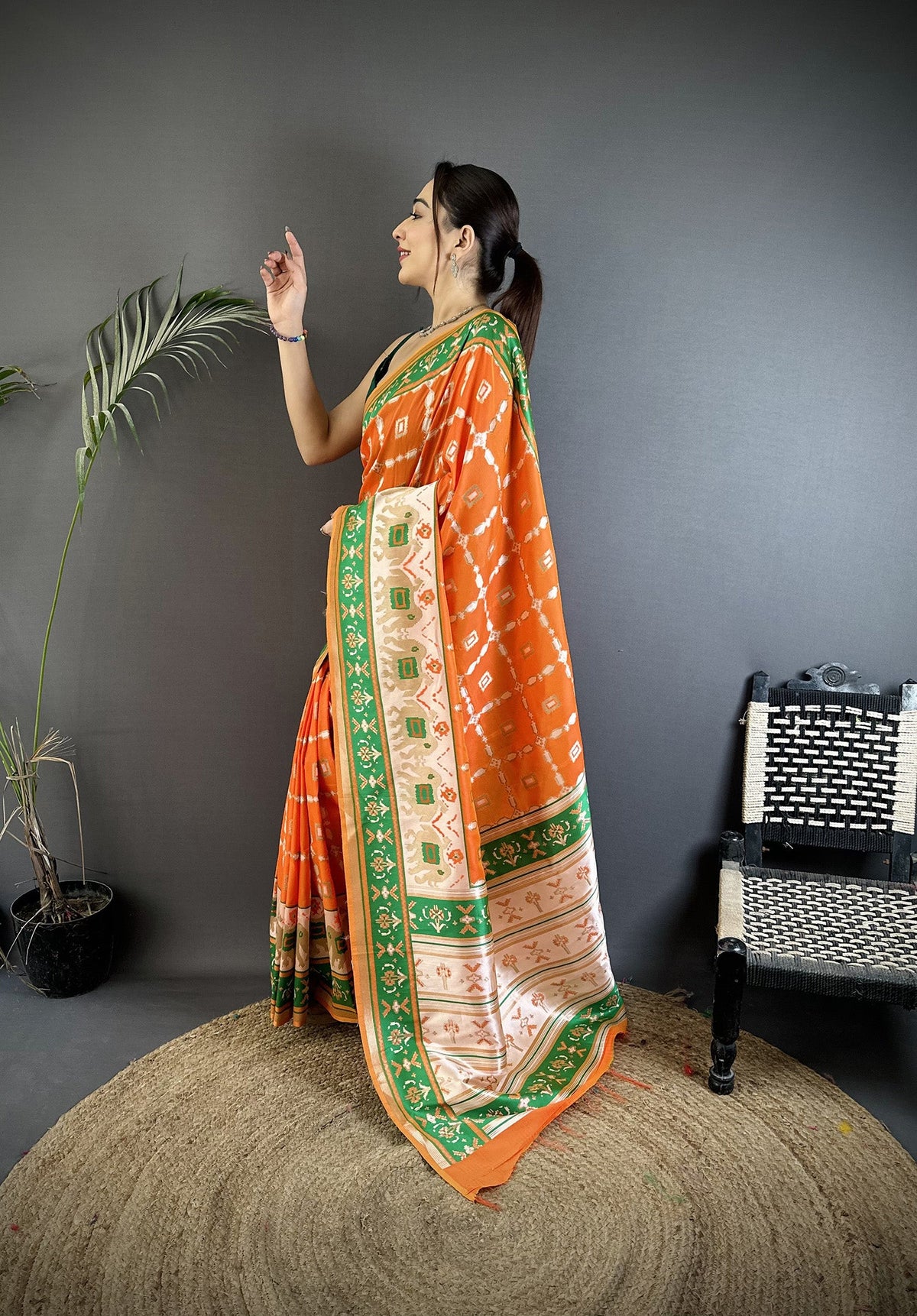 Orange Banarasi Silk Saree with Nature-Inspired Motifs