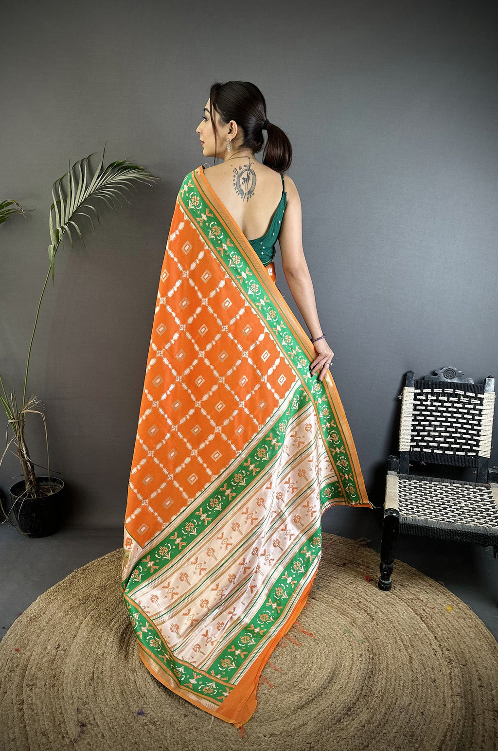 Orange Banarasi Silk Saree with Nature-Inspired Motifs