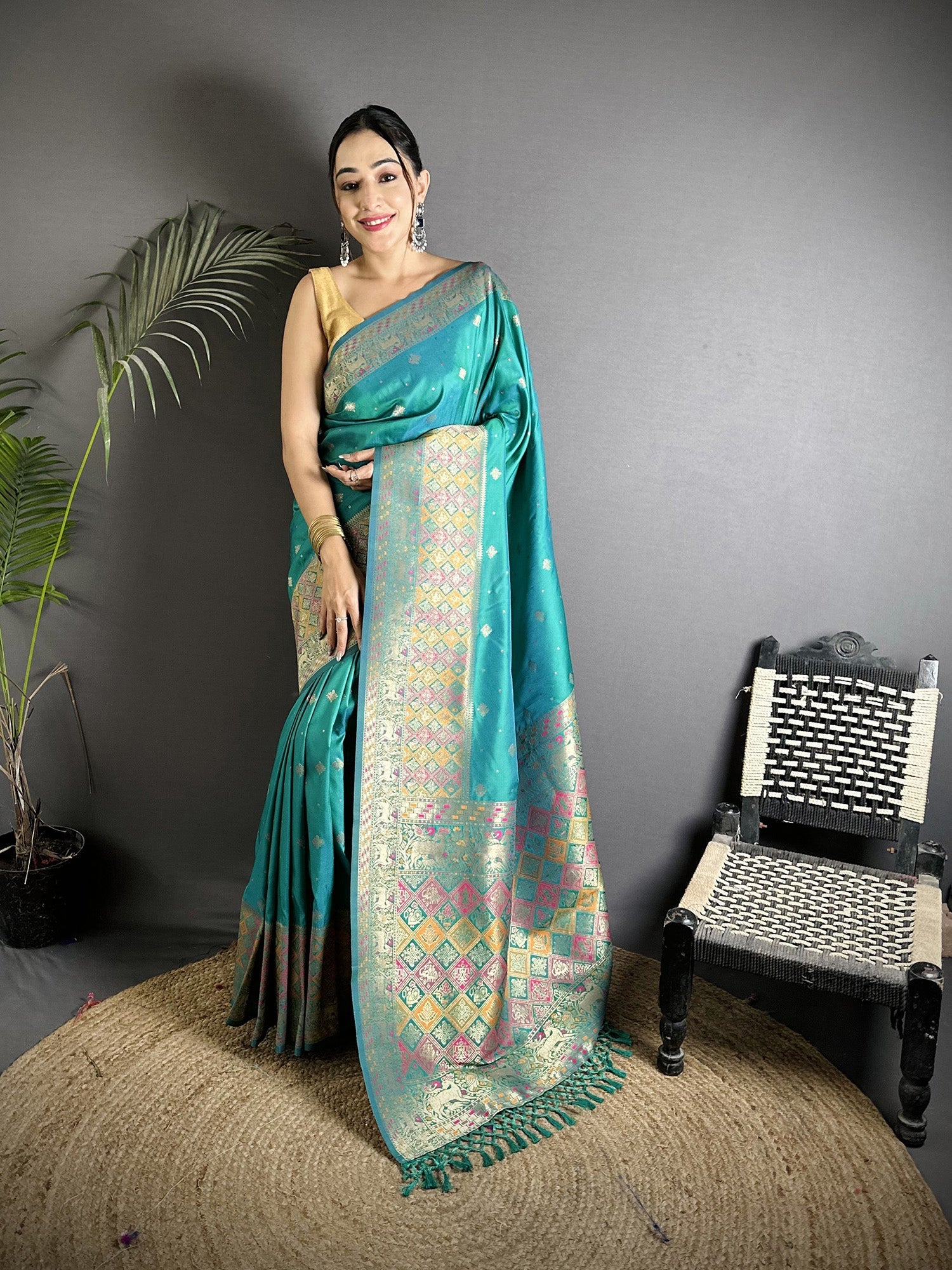 Teal Green Soft Lichi Silk saree with intricate multicolour Minakari weaving patterns