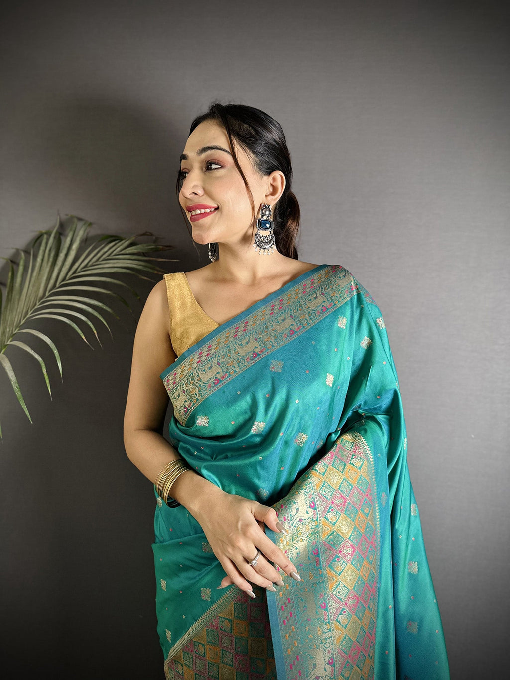 Teal Green Soft Lichi Silk Saree with Multicolour Minakari Weaving
