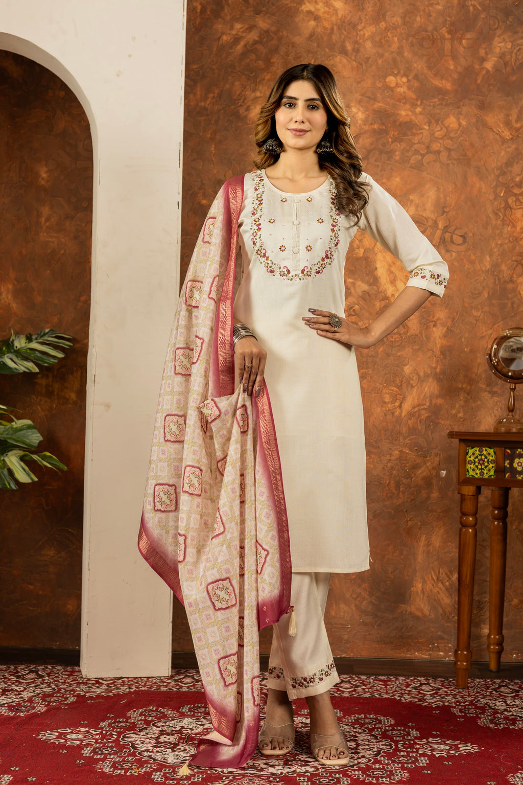 Off-white marina silk kurta set with multi-color floral embroidery and hand-work details