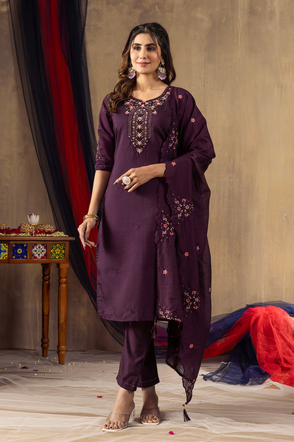 Close up of a Wine Roman silk kurta featuring intricate sequin embroidery and detailed hand-work.
