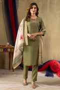A luxurious green shimmer gold silk kurta set with intricate multi-thread embroidery, hand-work, pants, and a dupatta.
