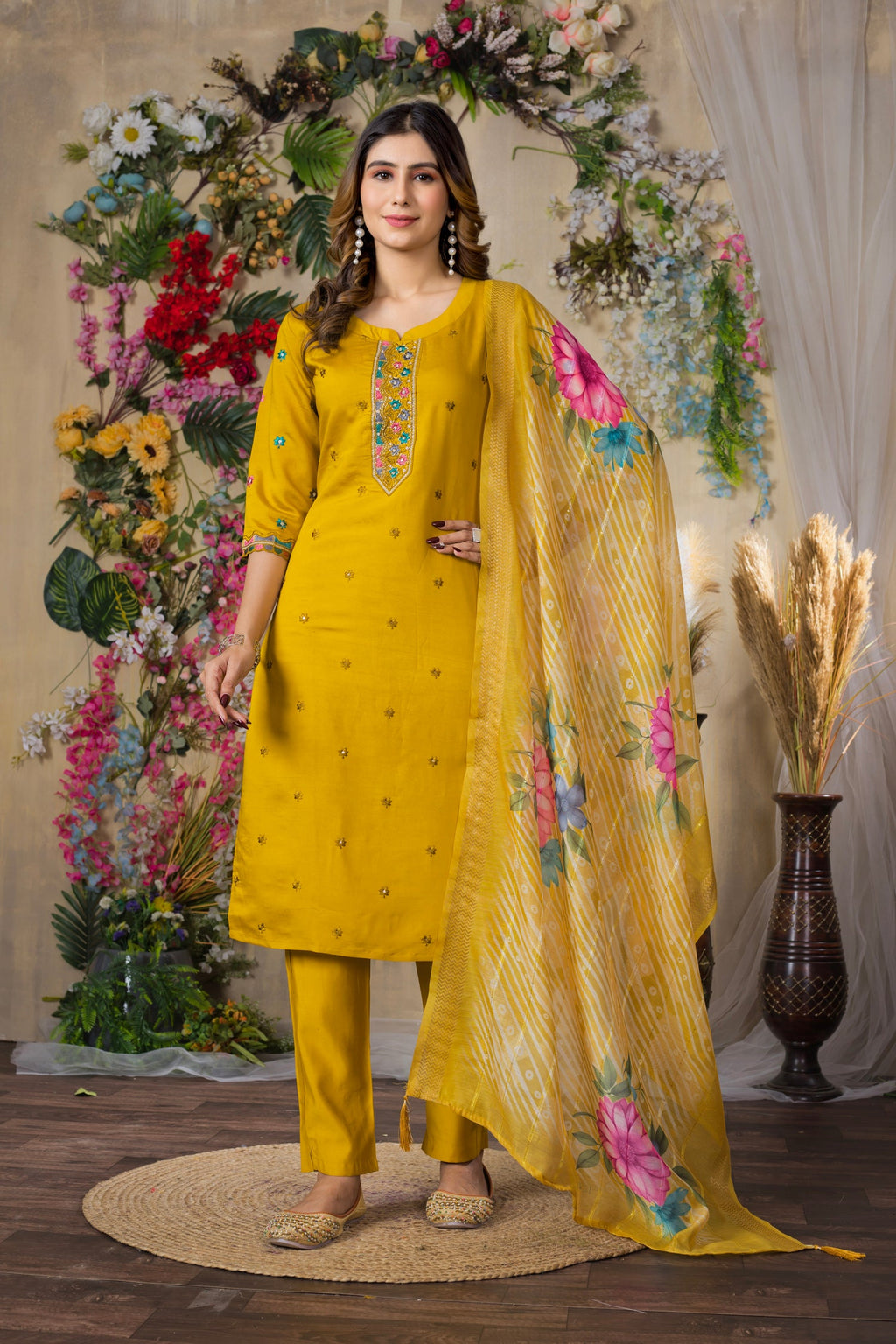 Mustard yellow Roman silk kurta pant set with intricate multi-thread embroidery.