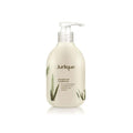 White and green bottle of Jurlique Sandalwood Conditioner 10 OZ
