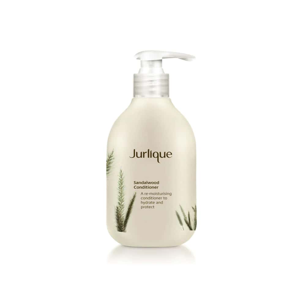 White and green bottle of Jurlique Sandalwood Conditioner 10 OZ