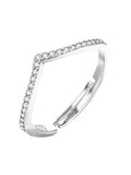 Adjustable silver-tone brass ring worn on a finger showing minimalist design