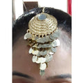 Heavy bridal gold maang tikka with intricate traditional design for weddings