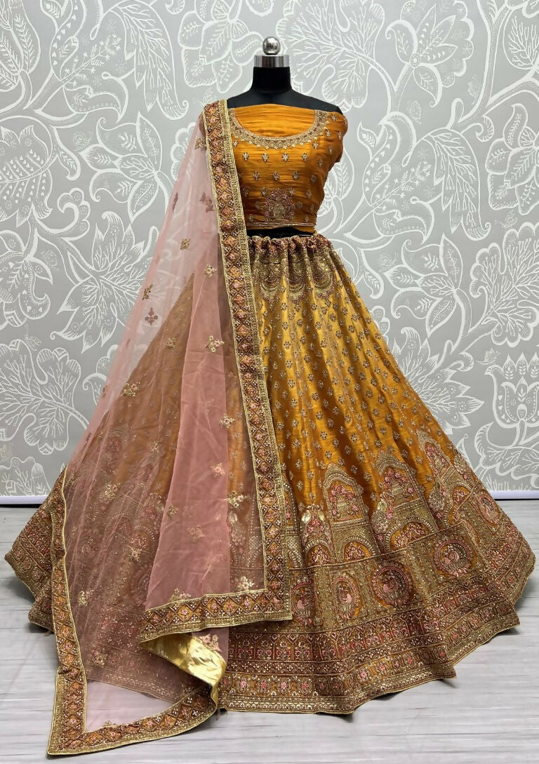 Golden bridal net lehenga choli with ornate dori and diamond embroidery