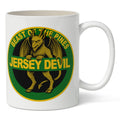 Green and white Jersey Devil highway sign design on a premium ceramic coffee mug