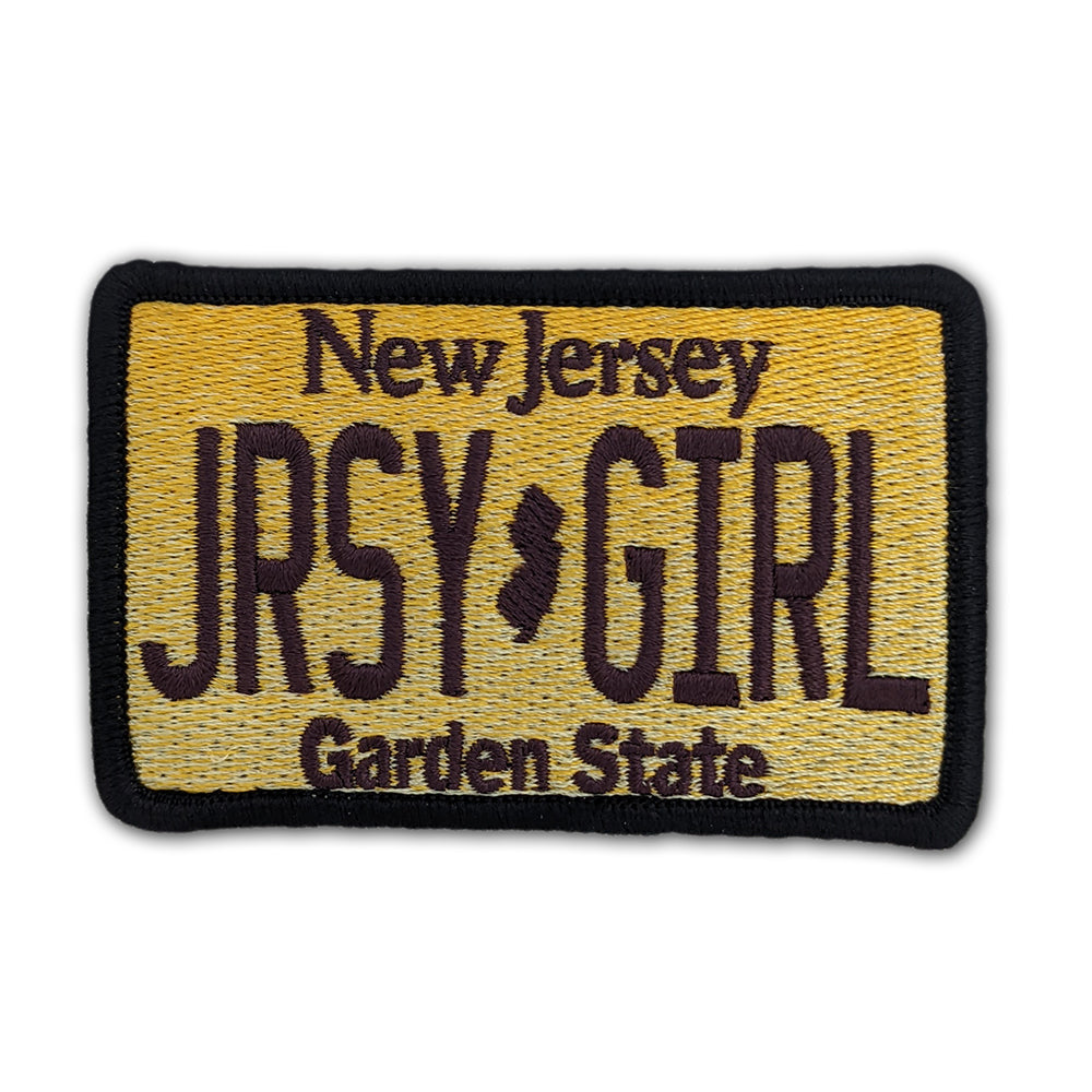 Jersey Girl license plate patch in yellow and black, rectangular design.