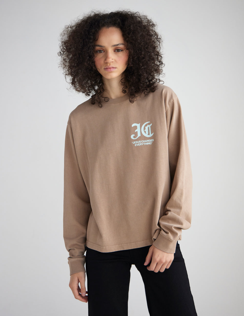 Close up of 320 GSM heavyweight cotton texture on a long sleeve graphic tee.