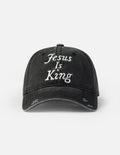 A soft, washed cotton Jesus Is King baseball cap with a relaxed fit and buckle closure.