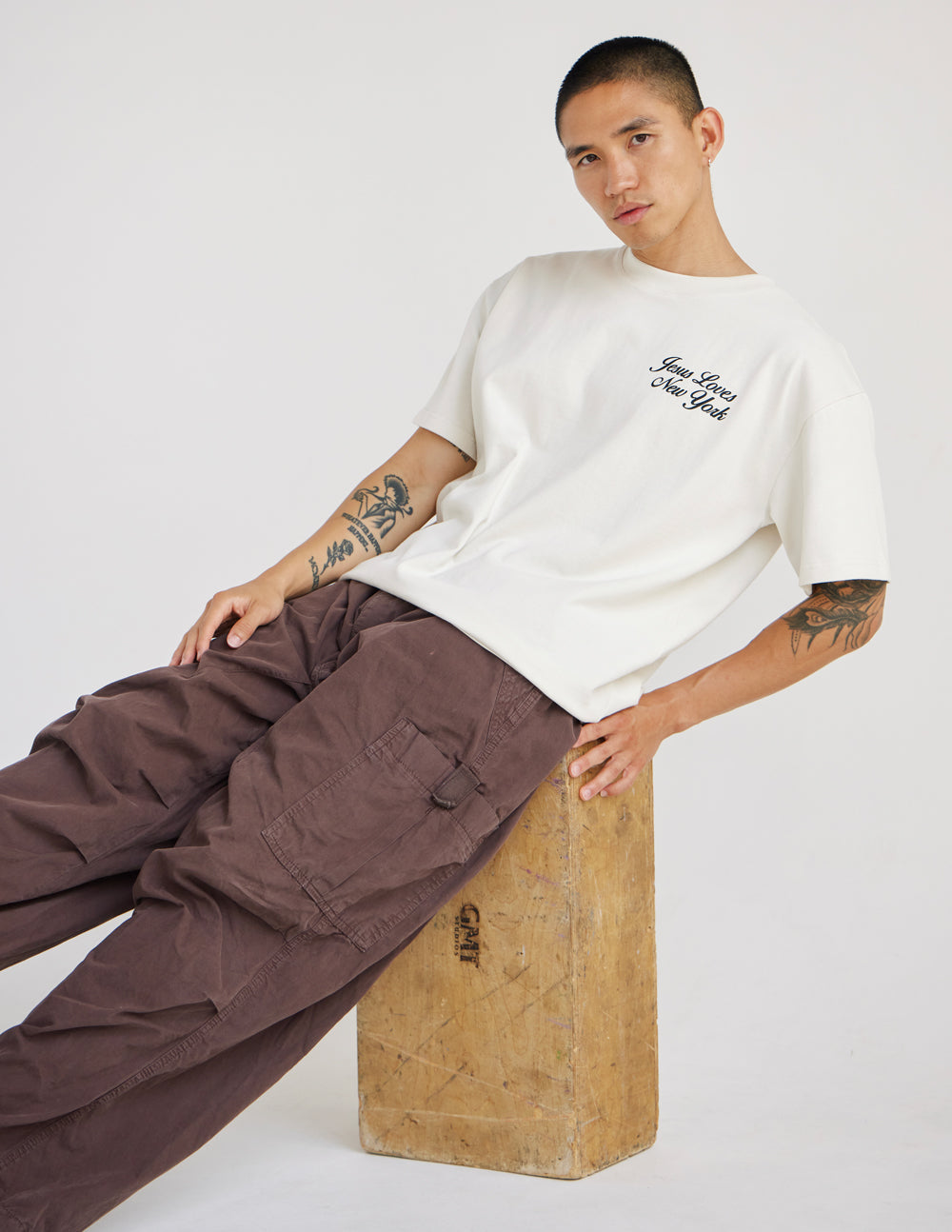 Jesus Loves New York graphic tee in off-white, cream, and blue heavyweight cotton