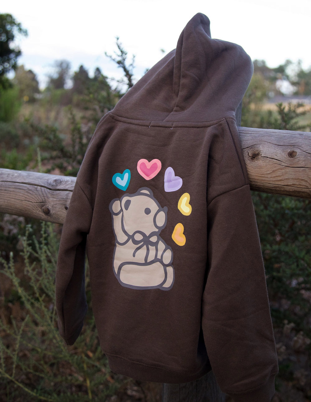 Kids brown oversized Jesus Loves You hoodie made of soft cotton