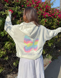 Jesus Saved My Life Unisex Hoodie in Cloud Dancer color worn by a model