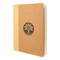 A stack of A5 kraft paper journal refills with minimalist design in tan and brown