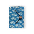 A5 handcrafted journal in a solid aquamarine blue color.