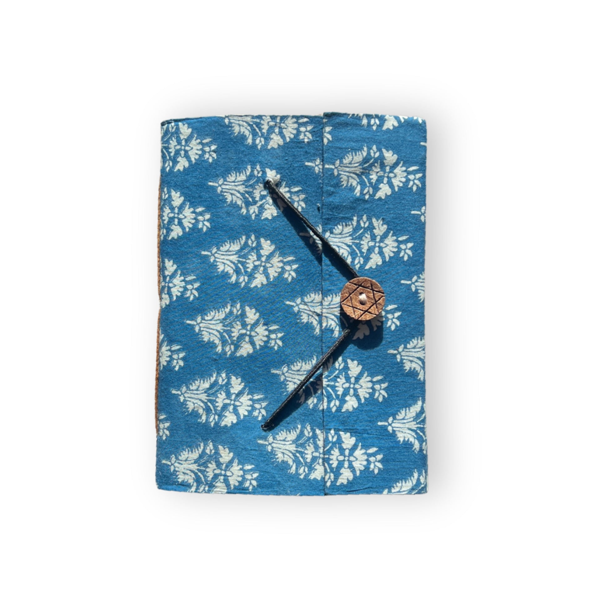 A5 handcrafted journal in a solid aquamarine blue color.